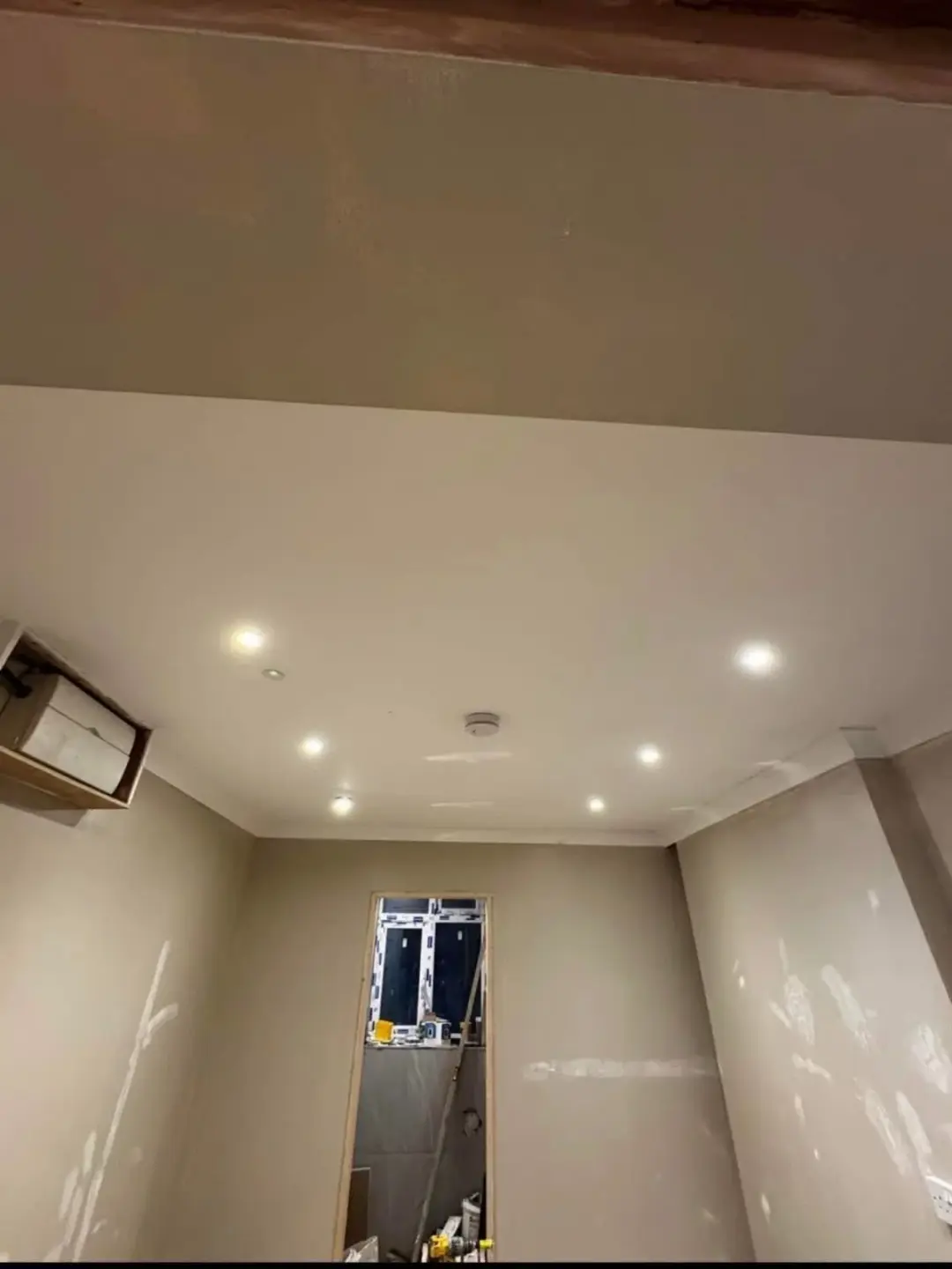 Room with LED downlights fitted in the ceiling